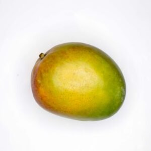 green round fruit on white surface